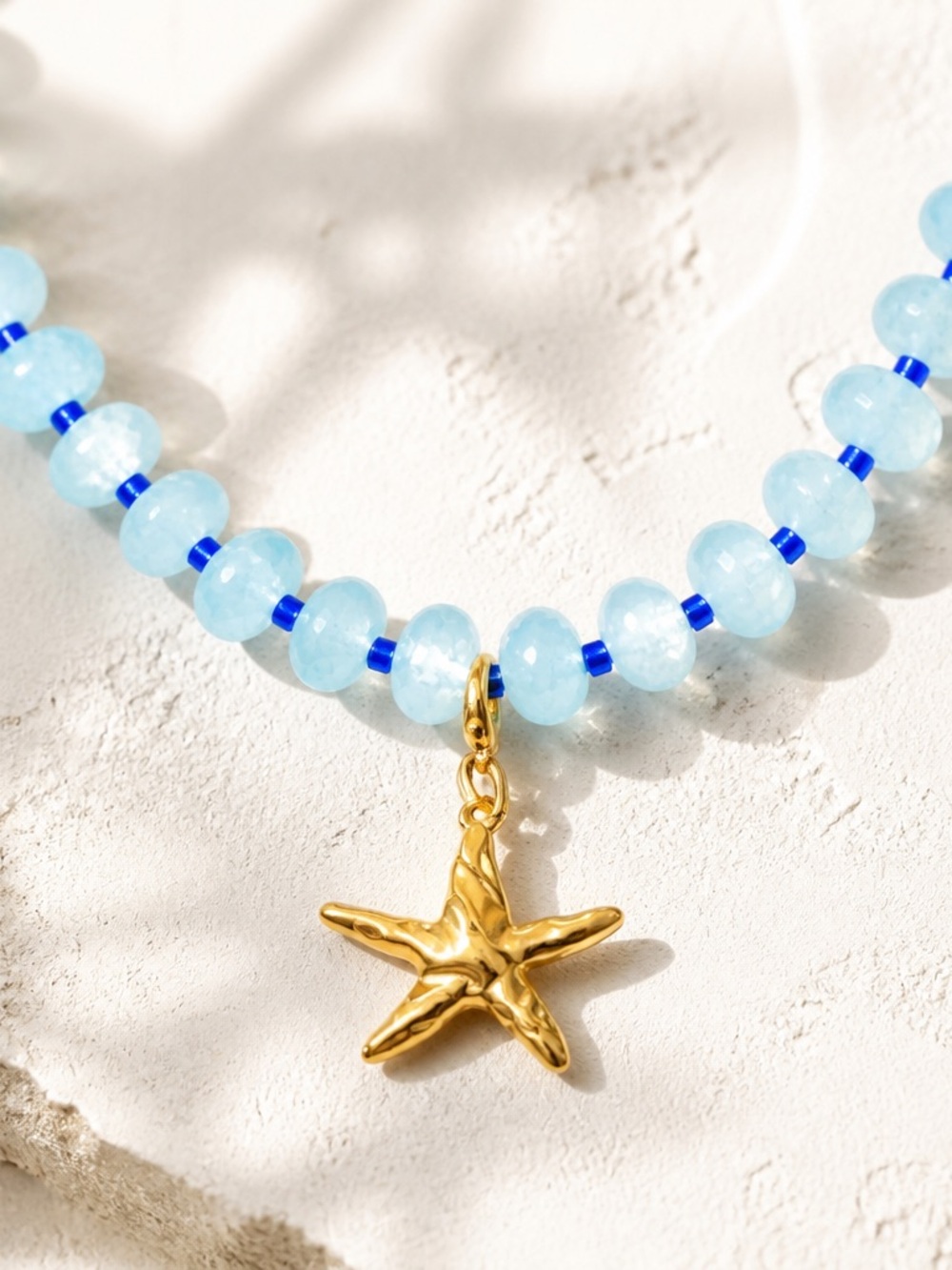 Gold Starfish Charm Necklace with Light Blue Beads